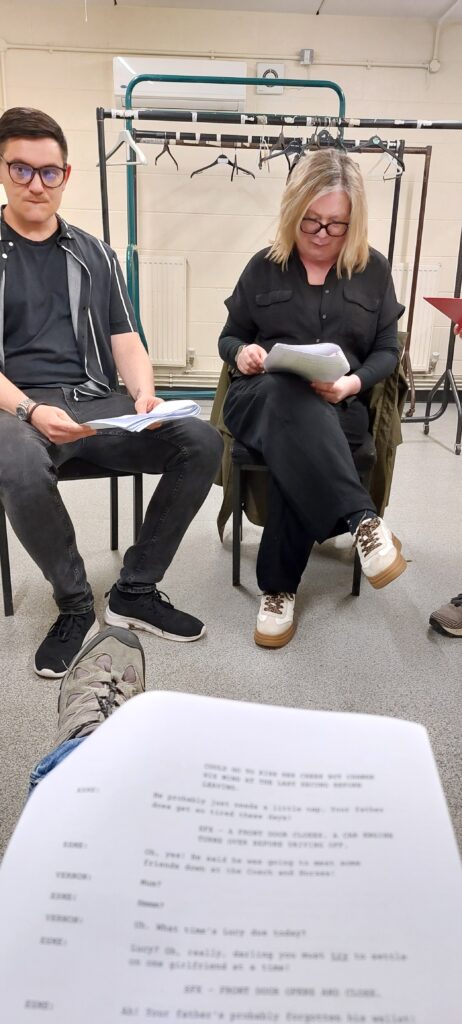 Image of script and rehearsed reading with a script